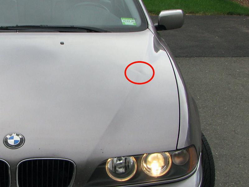 IMG_1411b.JPG - Slight ding in hood - probably easily remove with paintless dent removal.